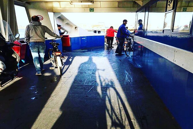 Amsterdam's Hidden Gems and Street Art Bike Tour - Faralda Crane Hotel: One Landmark, Many Photo Angles