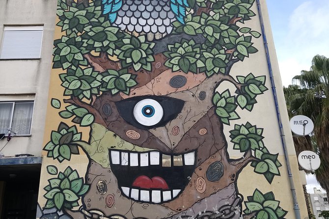 Discover Lisbon's Best Street Art - A Lisbon mural hotspot and the Eduardo Kobra scale moment
