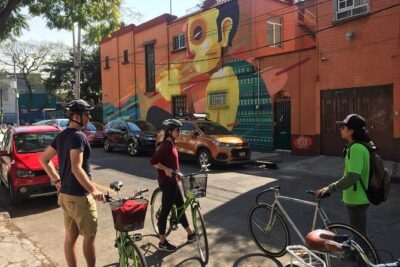 Graffiti & Urban Art Biketour w/ taco stop - Doctores Neighborhood: Graffiti Walls, Political Energy, and the Antique Toy Museum Exterior