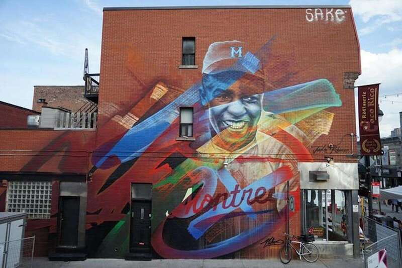 Montreal: The Original Locally Owned Street Art Walking Tour - Saint-Laurent Boulevard and the Main: learning to read Montreal murals