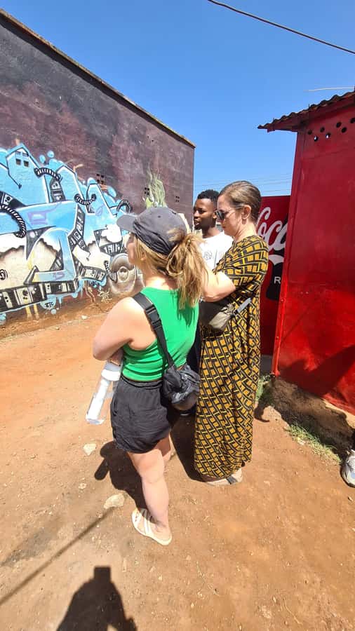 Nairobi: Kibera Street Art Tour with Local Artists - Meet at Gateway Supermarket, then walk Kibera for about two hours