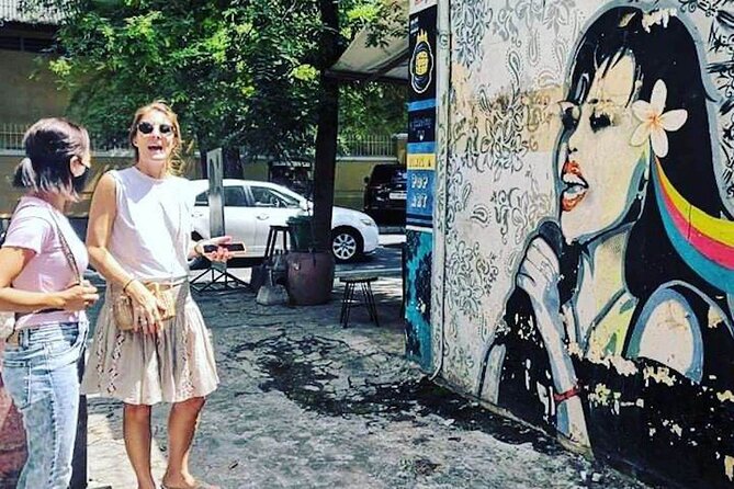 Phnom Penh's Morning Market and Street Art Tour by Tuk tuk - Stop 3: Independence Monument back alleys for quick-hit street art
