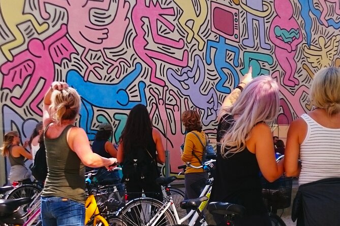 Pisa Street Art Self-Guided Bike Tour - Your first mural stop: Keith Haring’s Tuttomondo (1989)