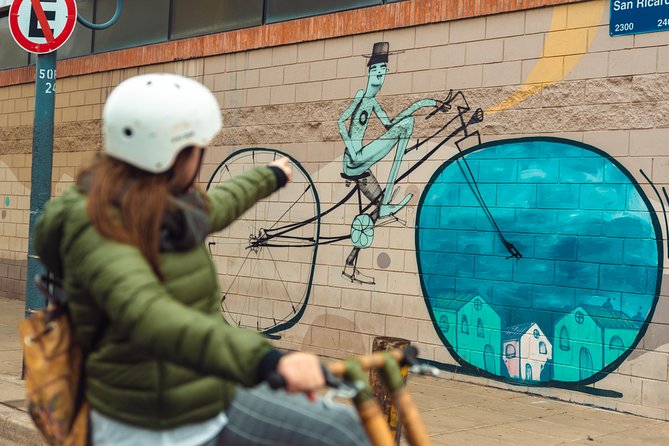 Private Off the Beaten Path: Hidden Urban Art Bike Tour - La Boca backstreets, color traditions, and murals with meaning