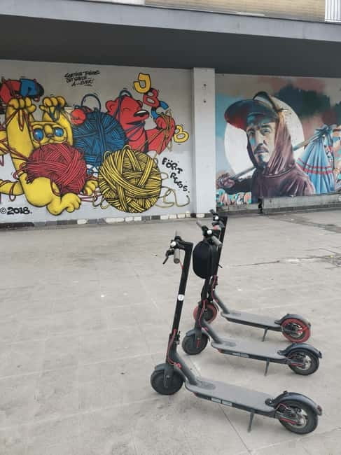 Street Art E Scooter tour - Three urban neighborhoods: what you’ll actually notice