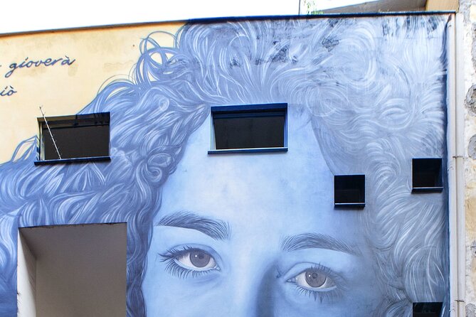 Street Art of Spanish Quarters and Maradona Tour - Maradona murals: Naples turns a soccer hero into street worship