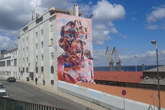 The Real Lisbon Street Art Private Guided Tour by Minivan - Your Guide Makes the Art Make Sense