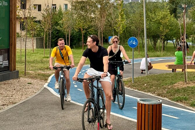 Tirana Mural Bike Tour: Street Art, Culture & Photography Stops - Lokomotiva: industrial textures and a tank turned to peace