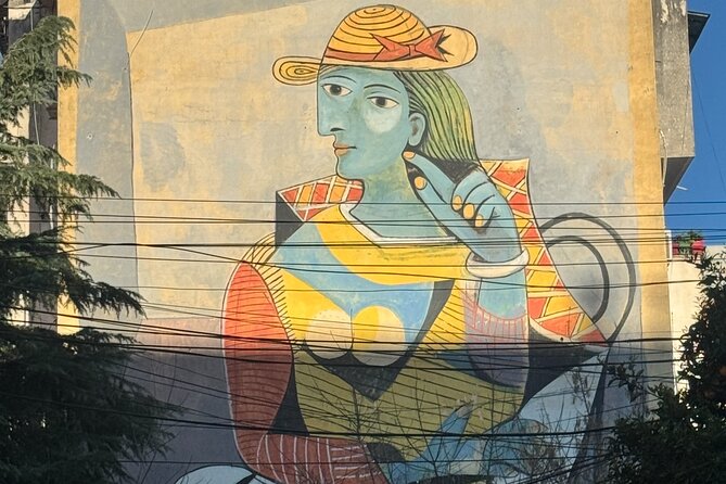 Tirana Mural Bike Tour: Street Art, Culture & Photography Stops - FAB Gallery and the upside-down bunker effect
