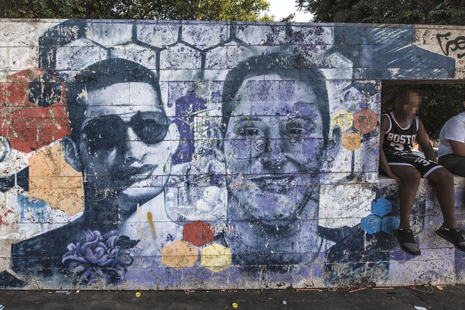 Torpignattara Photo Tour: melting pot, street art and politics - Torpignattara’s murals, writings, and the street-level story